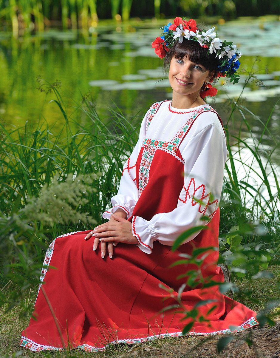 Beautiful girl Girls in Slavic costumes in City